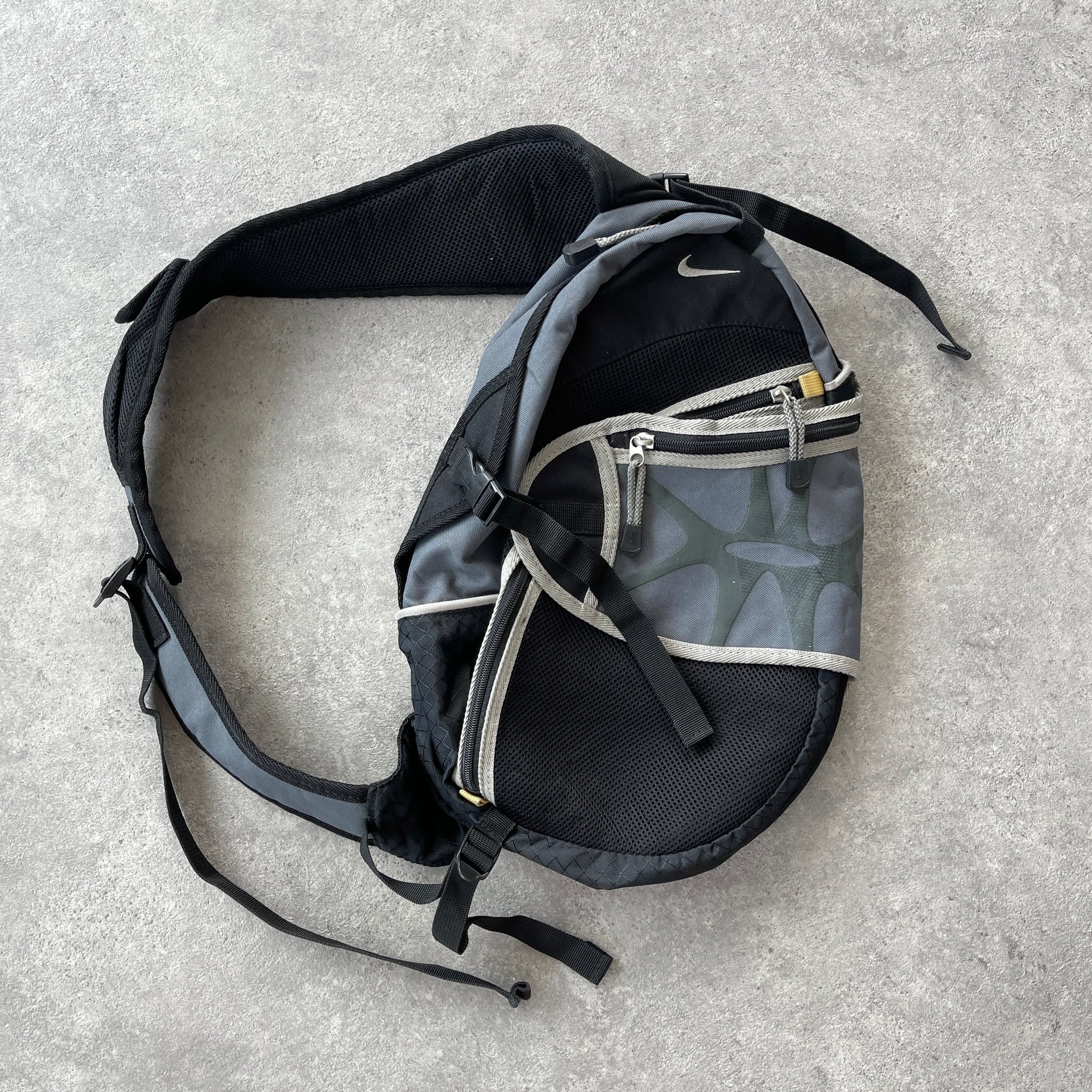 N*ke 1990s technical tri-harness sling bag