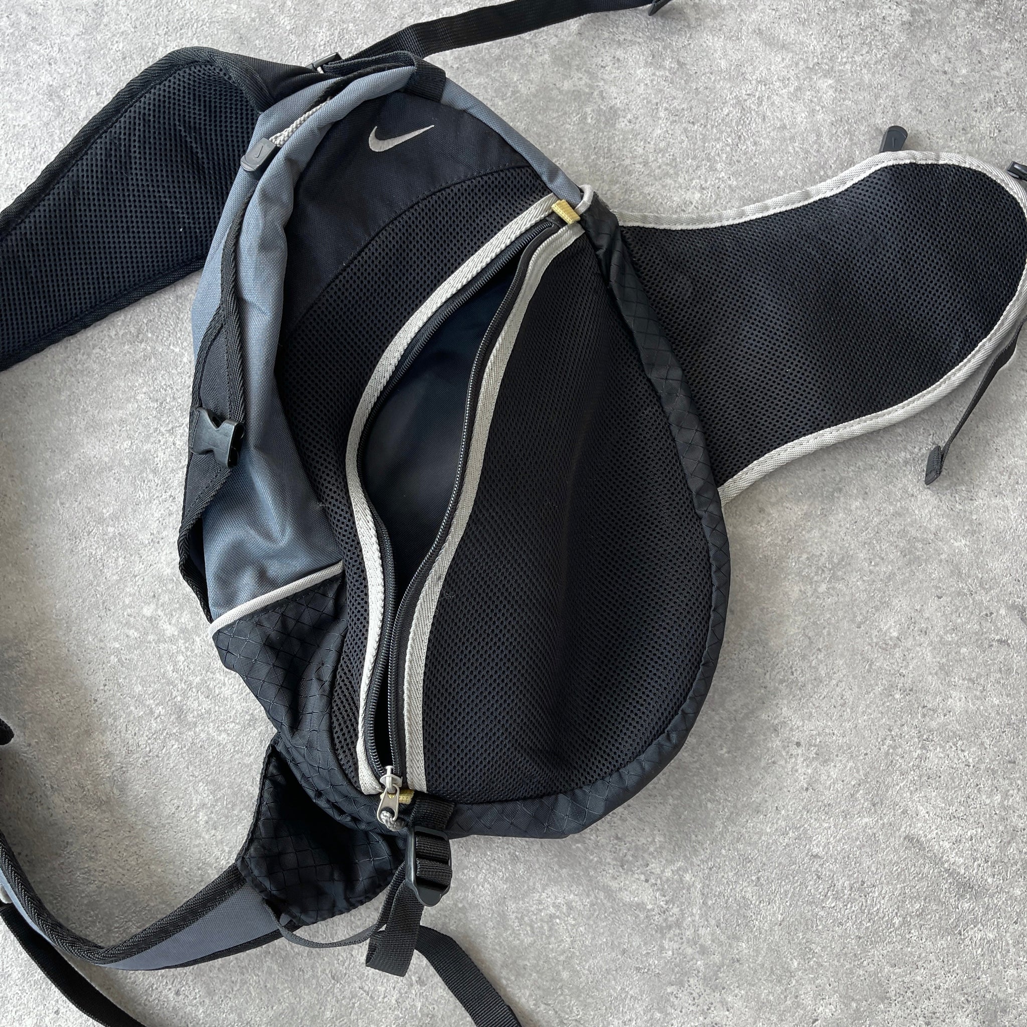 N*ke 1990s technical tri-harness sling bag