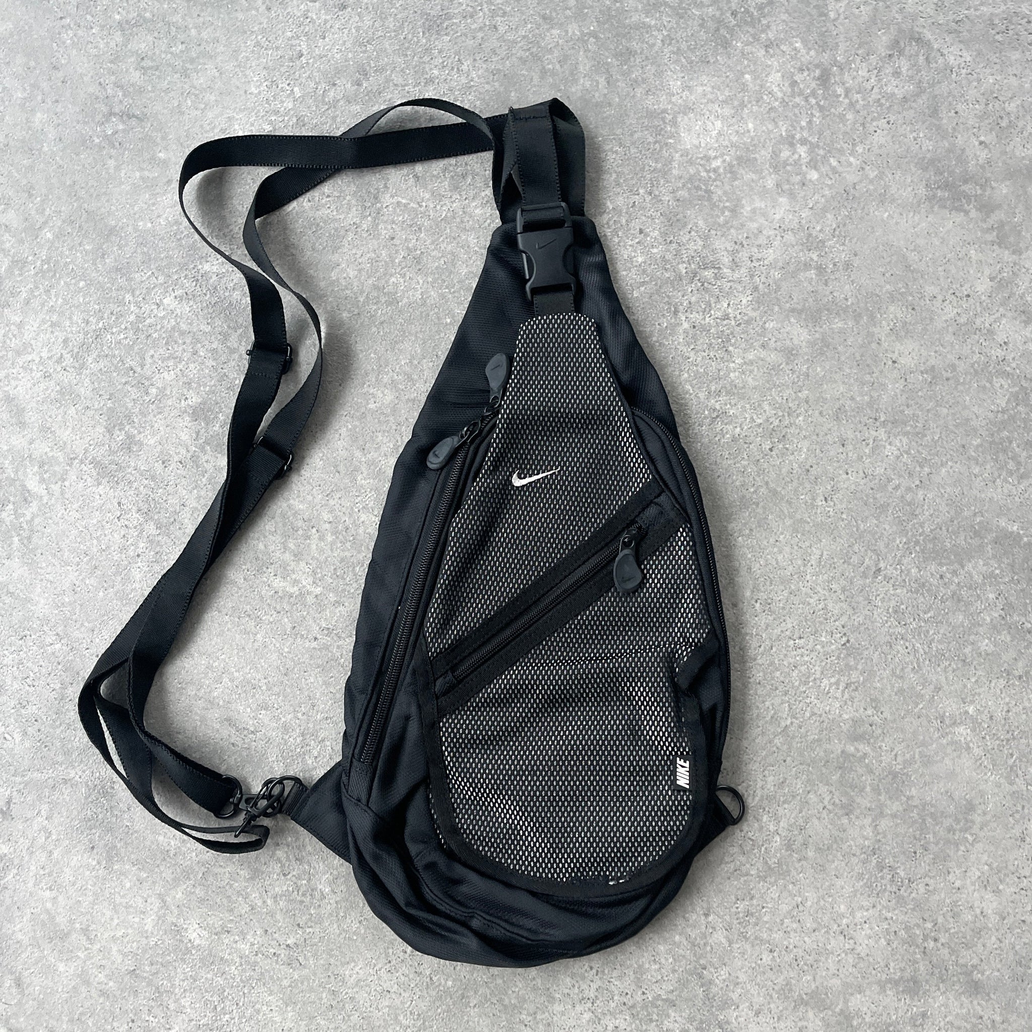 N*ke 1990s technical sling bag