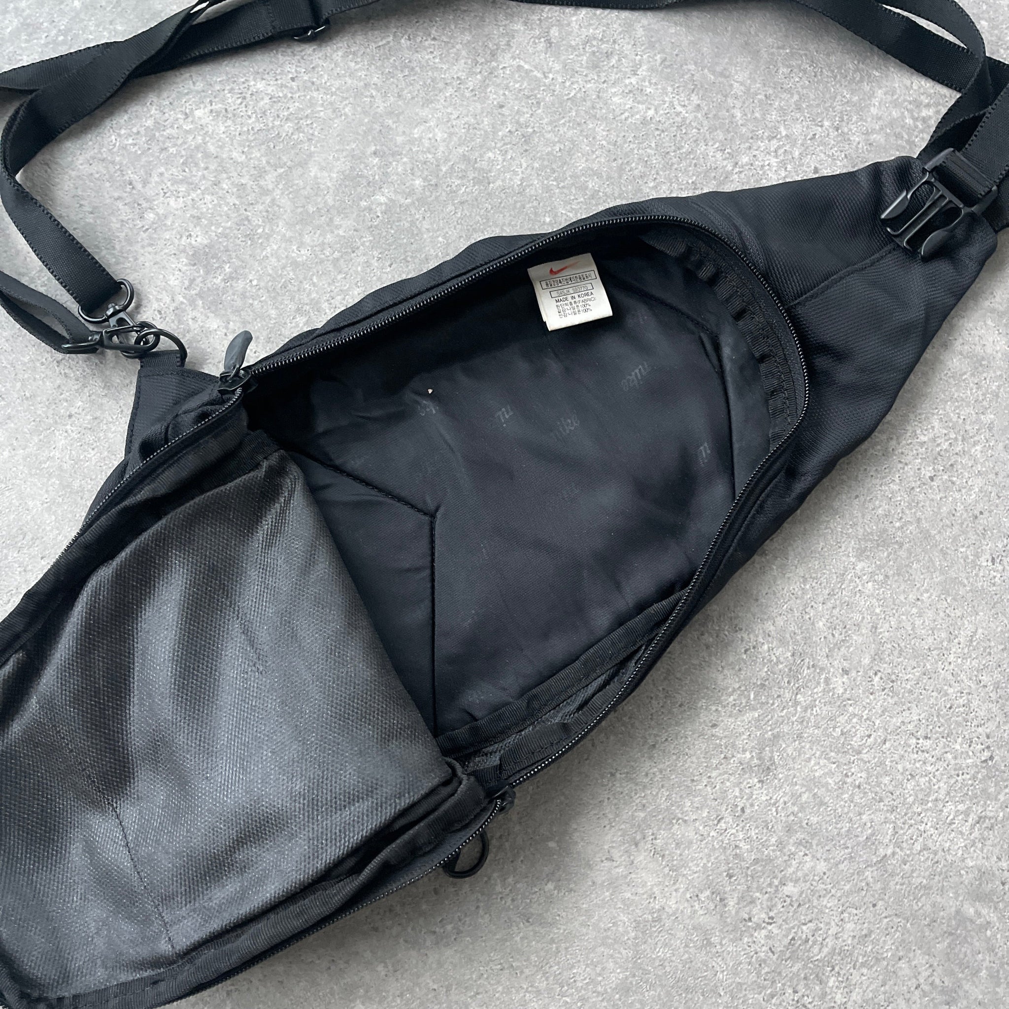 N*ke 1990s technical sling bag