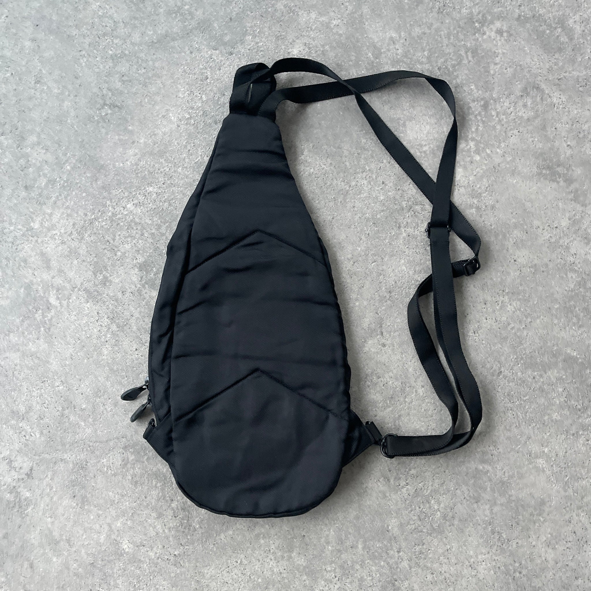 N*ke 1990s technical sling bag