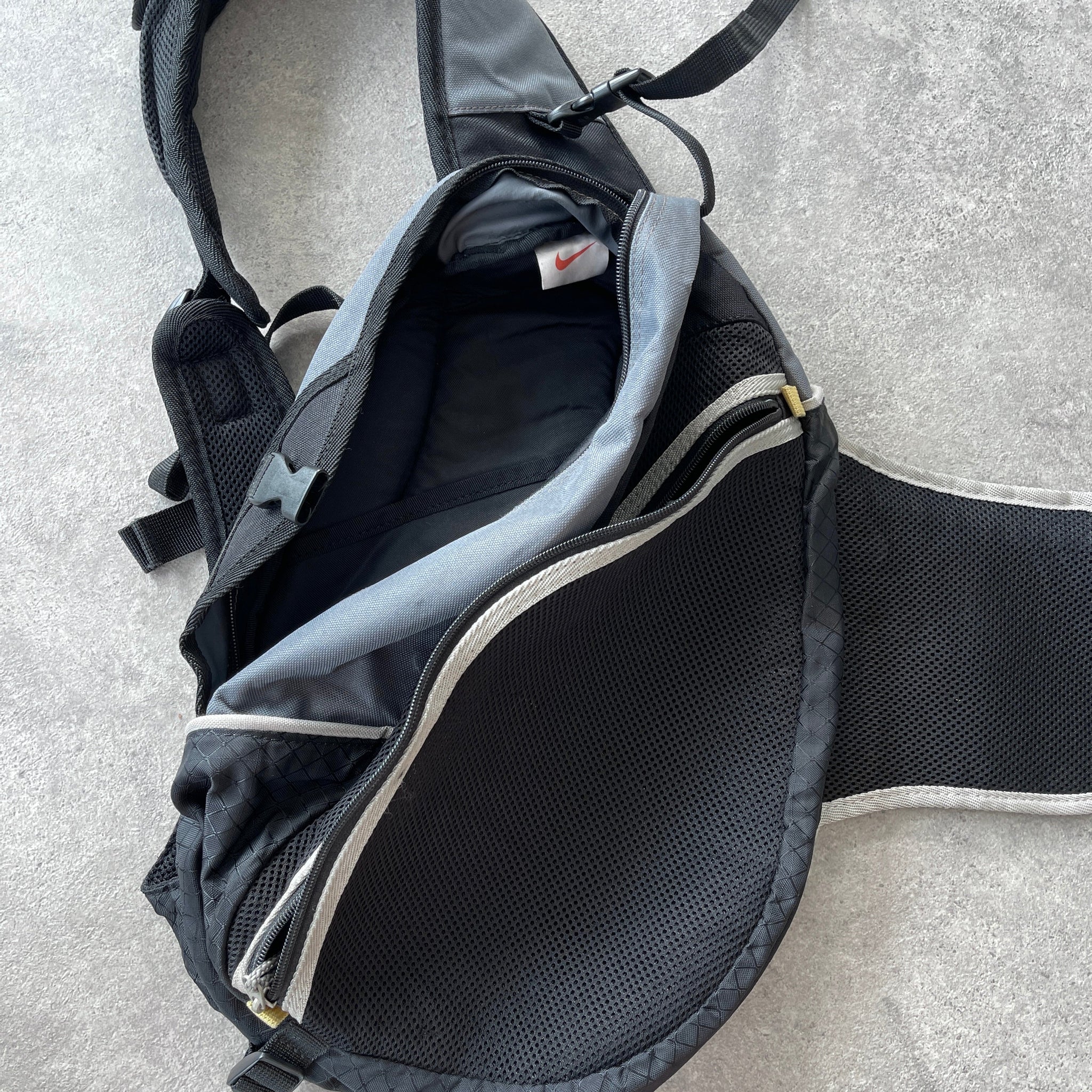 N*ke 1990s technical tri-harness sling bag