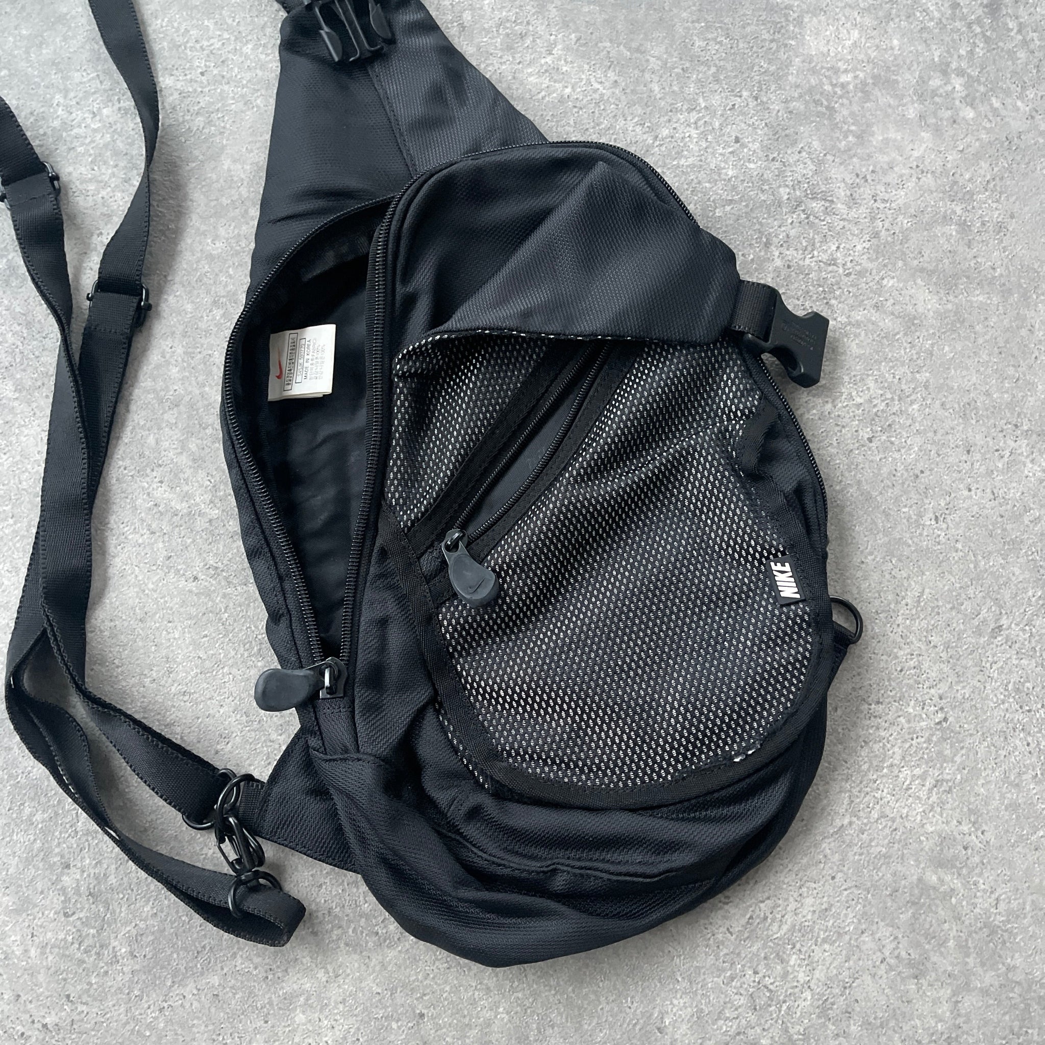 N*ke 1990s technical sling bag